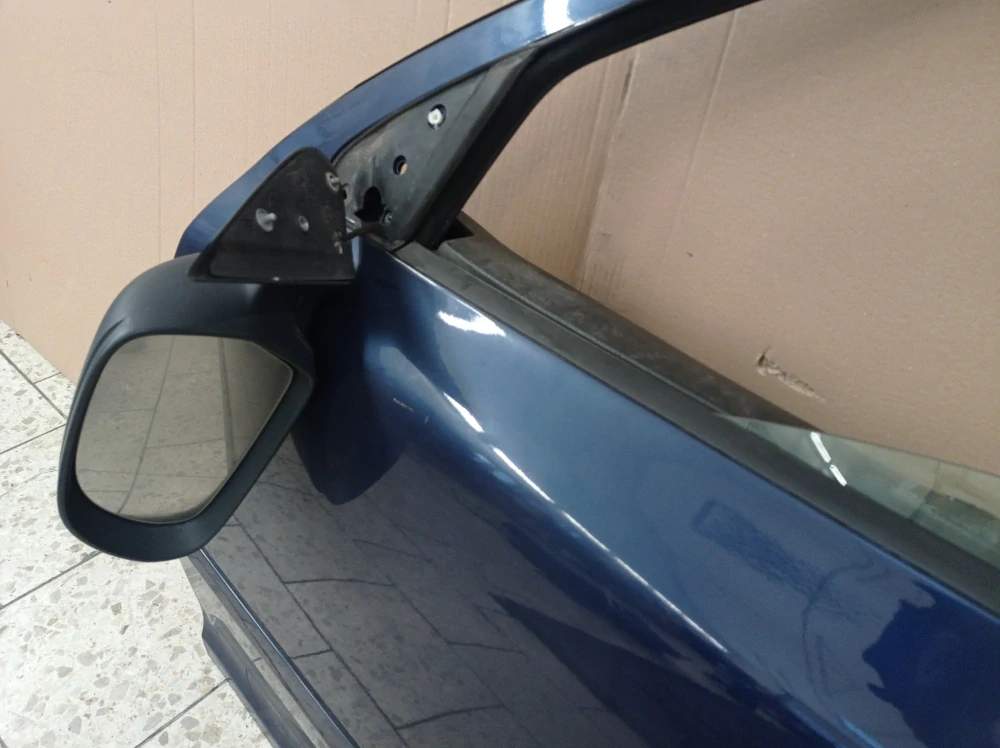 Škoda Octavia II levé přední dveře