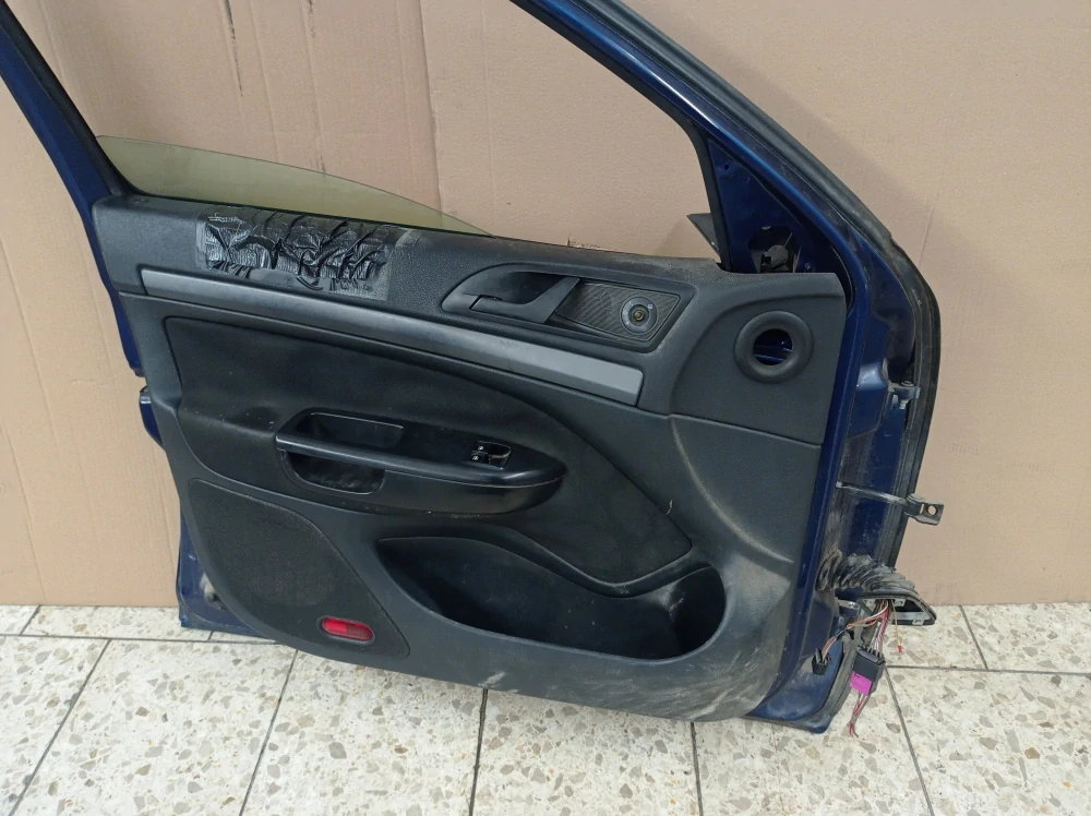 Škoda Octavia II levé přední dveře