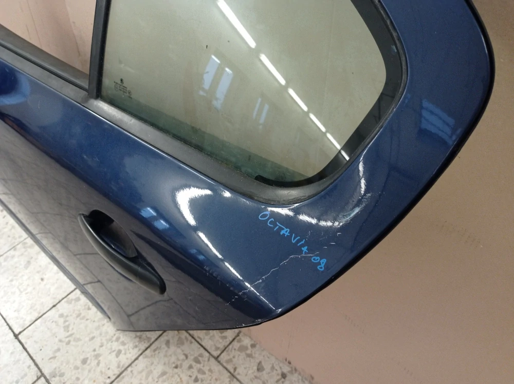 Škoda Octavia II levé zadní dveře
