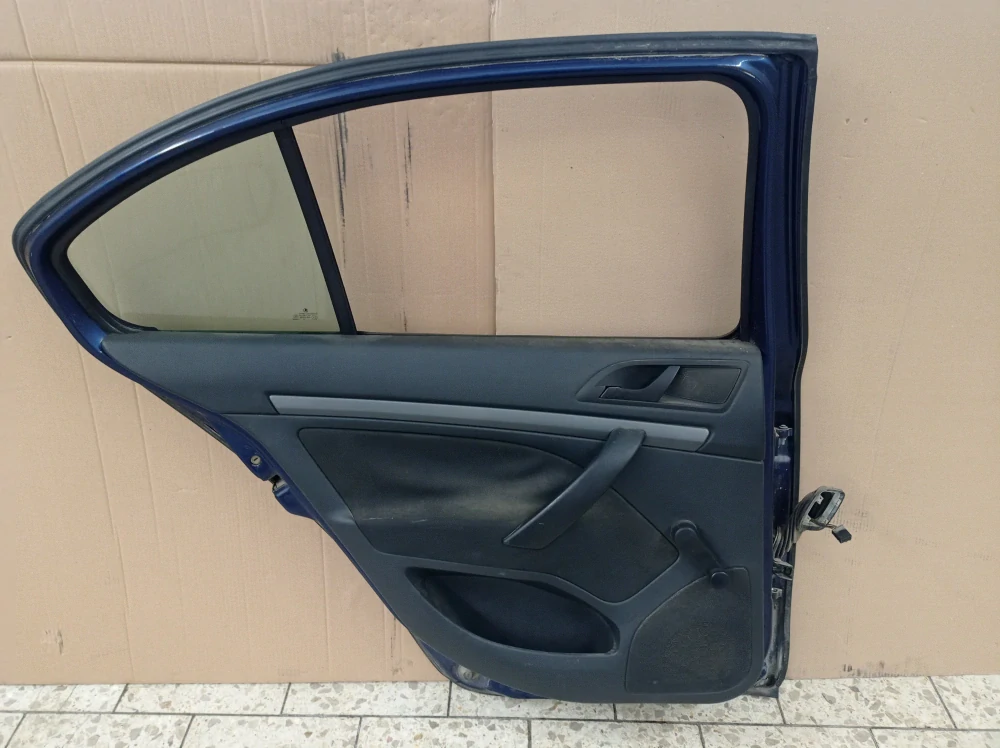 Škoda Octavia II levé zadní dveře
